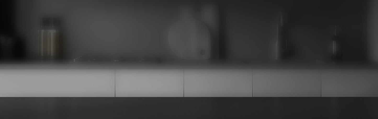 Blurred kitchen counter with various items